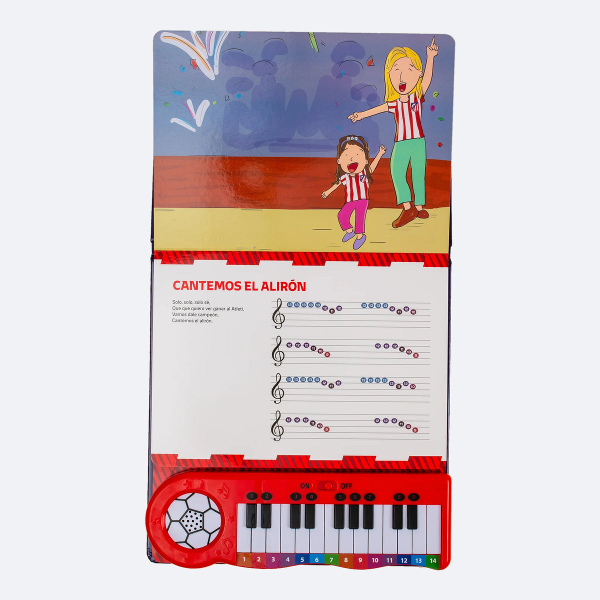 El Piano Libro abierto, con una doble página ilustrada y la partitura por colores sobre el teclado.