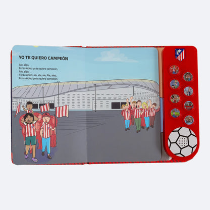 El Libro Musical abierto en una doble página ilustrada con jóvenes aficionados del Atleti a las puertas del Metropolitano.