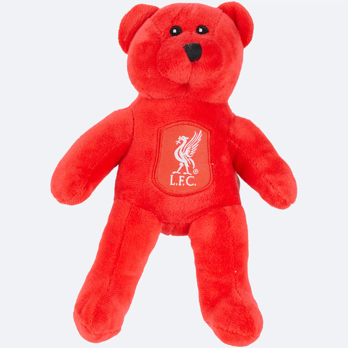 Roter Plüschbär des Liverpool FC mit dem Liverbird-Wappen auf der Brust, von vorn auf grauem Grund