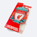 Geburtstagskarte des Liverpool FC mit Vereinswappen und dem Schriftzug Happy Birthday, stehend auf grauem Grund