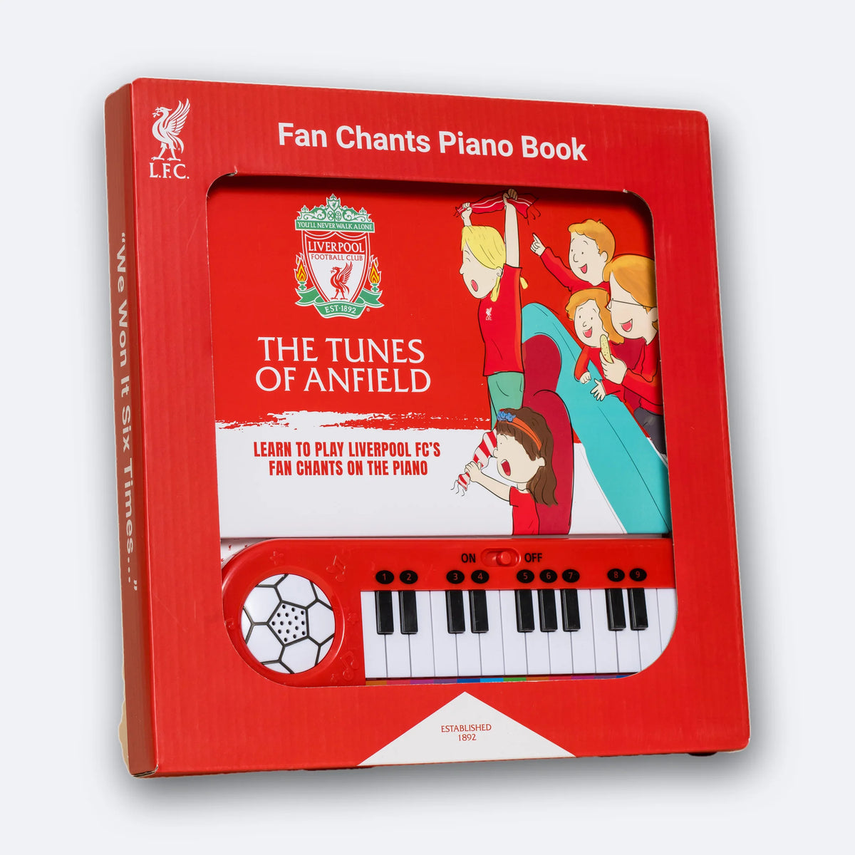 The Liverpool FC Fan Chants Piano Book in its gift box, front and side.