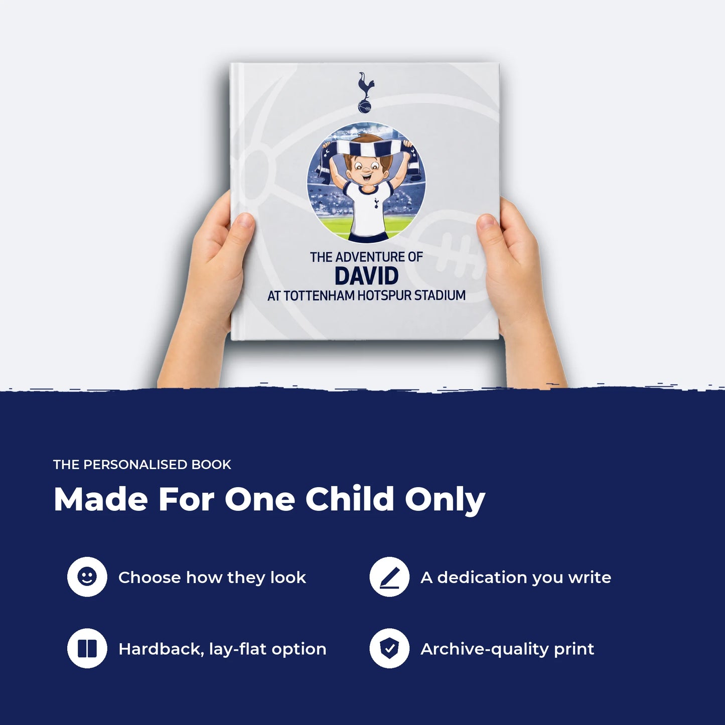 Two hands holding the Tottenham Hotspur Personalised Book, showing its size, with four features listed beside it.