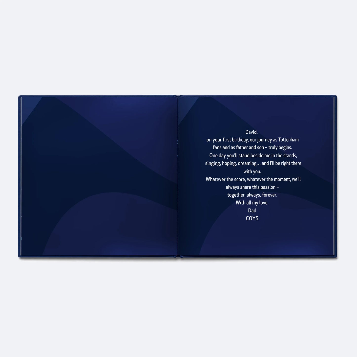 The Tottenham Hotspur Personalised Book lying open at the dedication page, the words the buyer writes printed in white on navy.