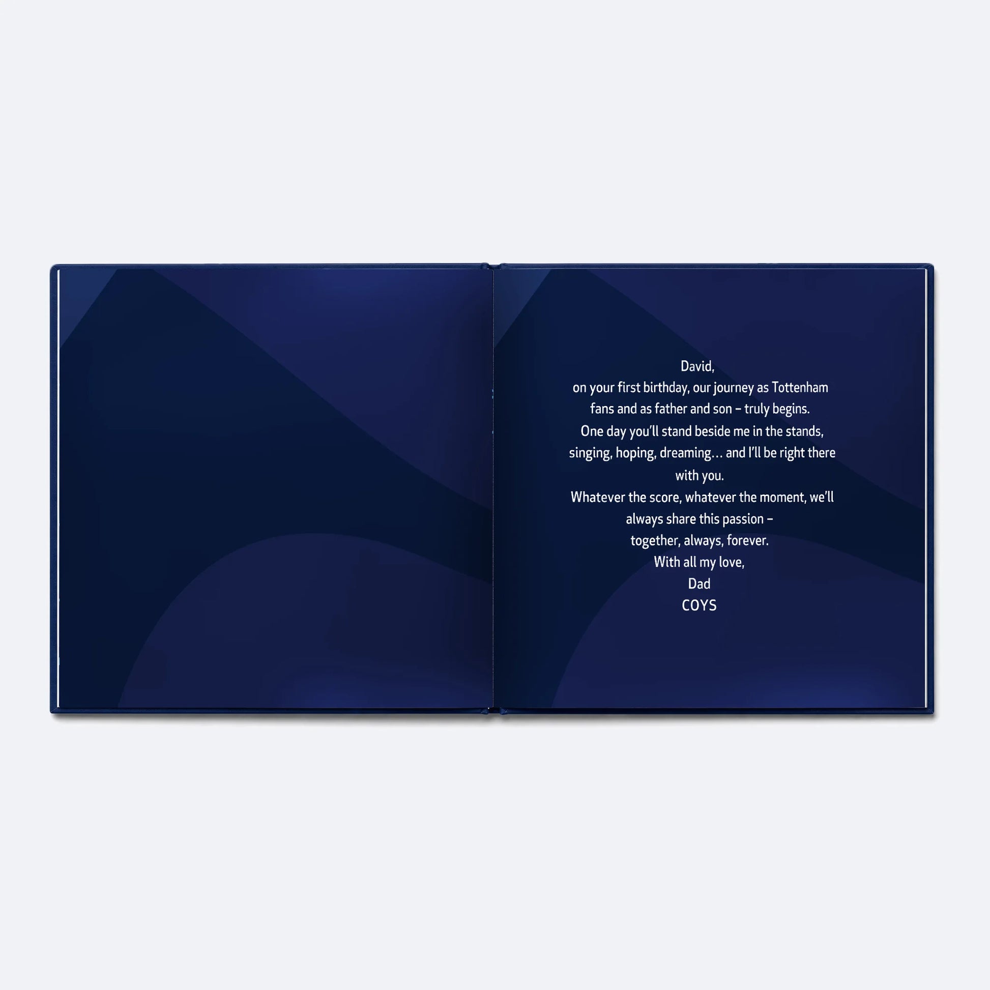 The Tottenham Hotspur Personalised Book lying open at the dedication page, the words the buyer writes printed in white on navy.