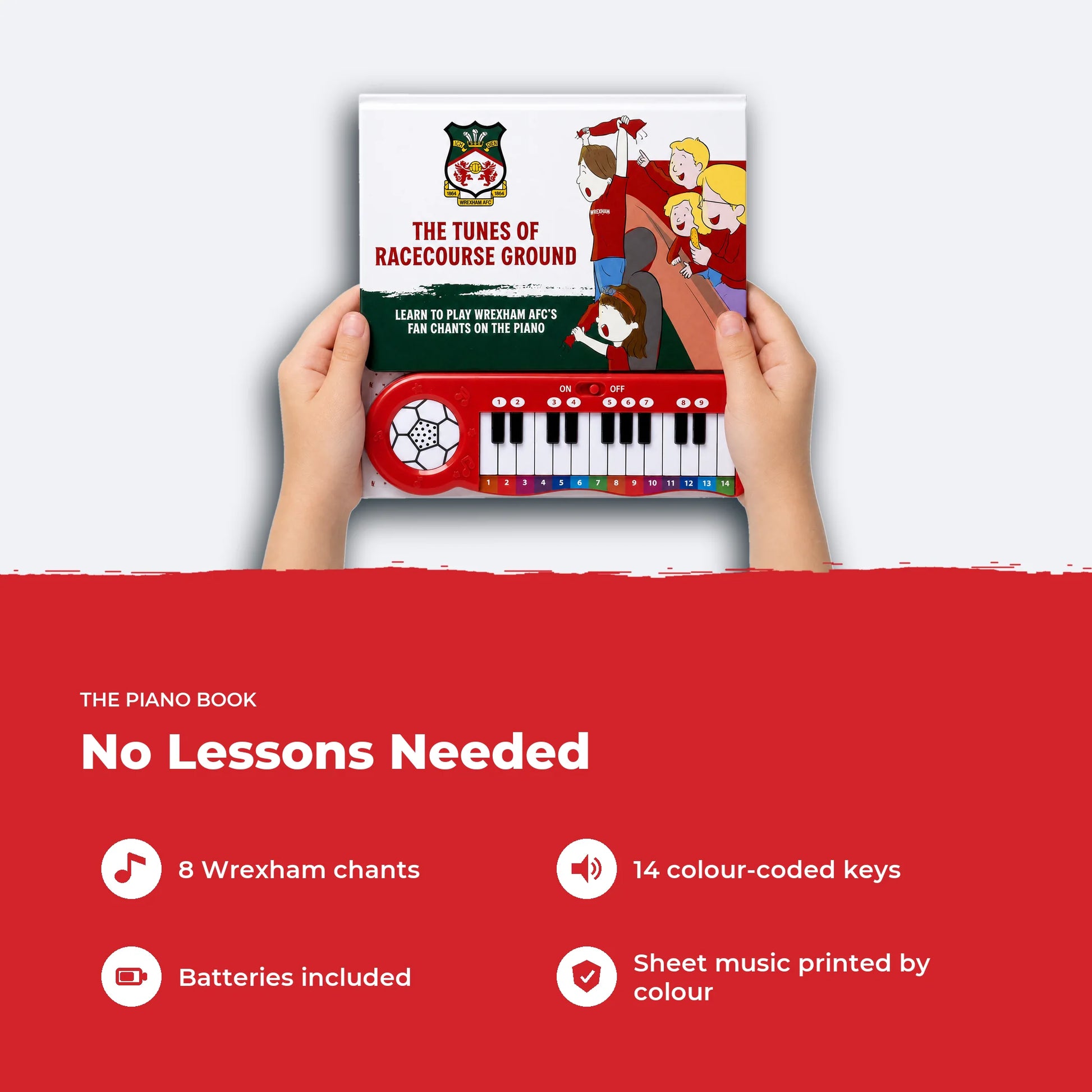 Two hands holding the Wrexham AFC Piano Book, showing its size, with four features listed beside it.