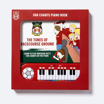 The Wrexham AFC Piano Book in its retail box, the keyboard visible through the window.