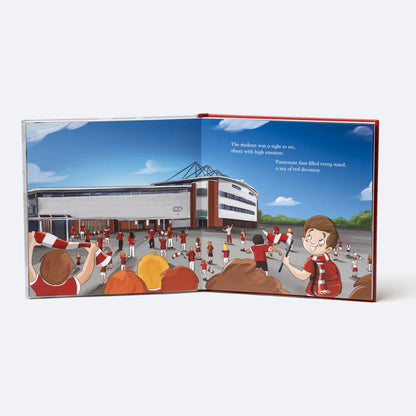 The Personalised Book open at the arrival spread, the child among the crowd outside the Racecourse Ground.