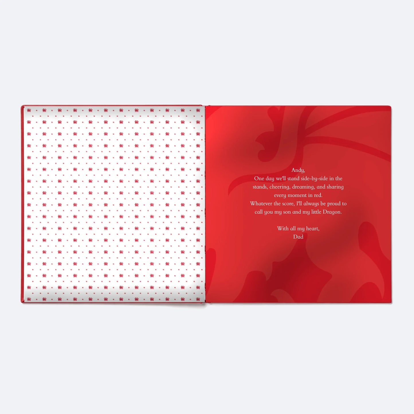 The Wrexham AFC Personalised Book lying open at the dedication page, the words the buyer writes printed in white on red.